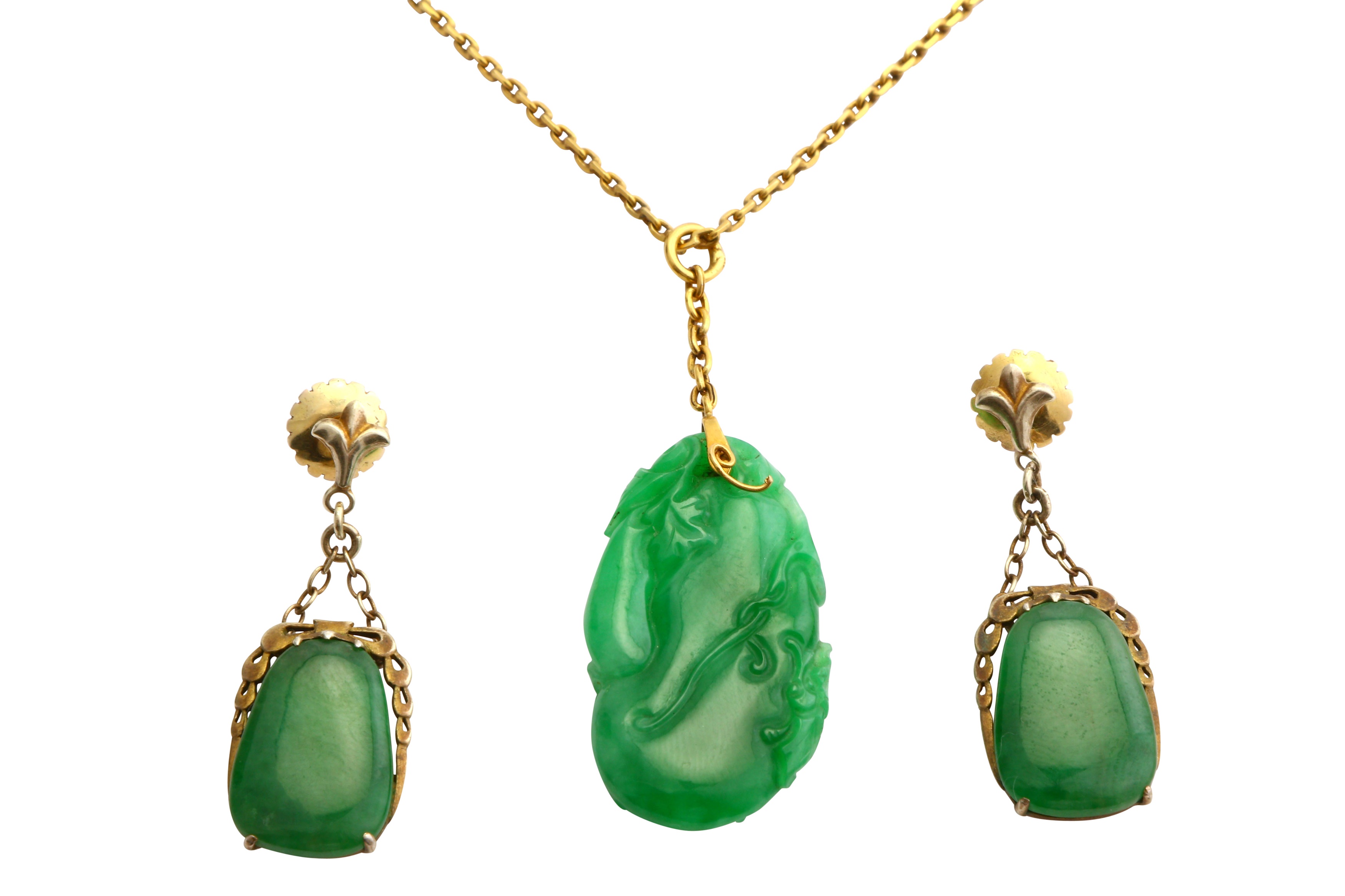 A jade pendant and a pair of jade earrings