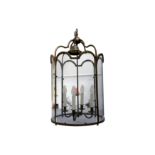 A pair of brass and glass pendant hall lanterns,