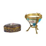 A mid to late 19th century Sevres style gilt mounted centrepiece
