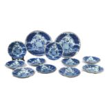 Ten mid 18th century Delft plates and two chargers in Camaïeu bleu