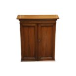 A circa 1900 walnut two door collectors cabinet