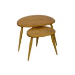 Ercol, a pair of blonde elm Pebble nesting tables