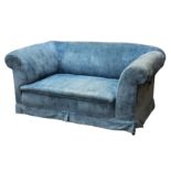 An early 20th Century blue upholstered Chesterfield style drop arm sofa