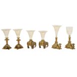 A set of six late Victorian gilt metal and glass single epergnes,