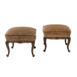 A pair of 18th Century style walnut footstools