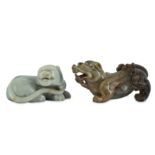 TWO CHINESE JADE CARVINGS OF LIONS.