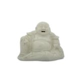 A CHINESE BLANC-DE-CHINE FIGURE OF BUDAI HESHANG.