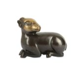 A CHINESE BRONZE FIGURE OF A RAM.