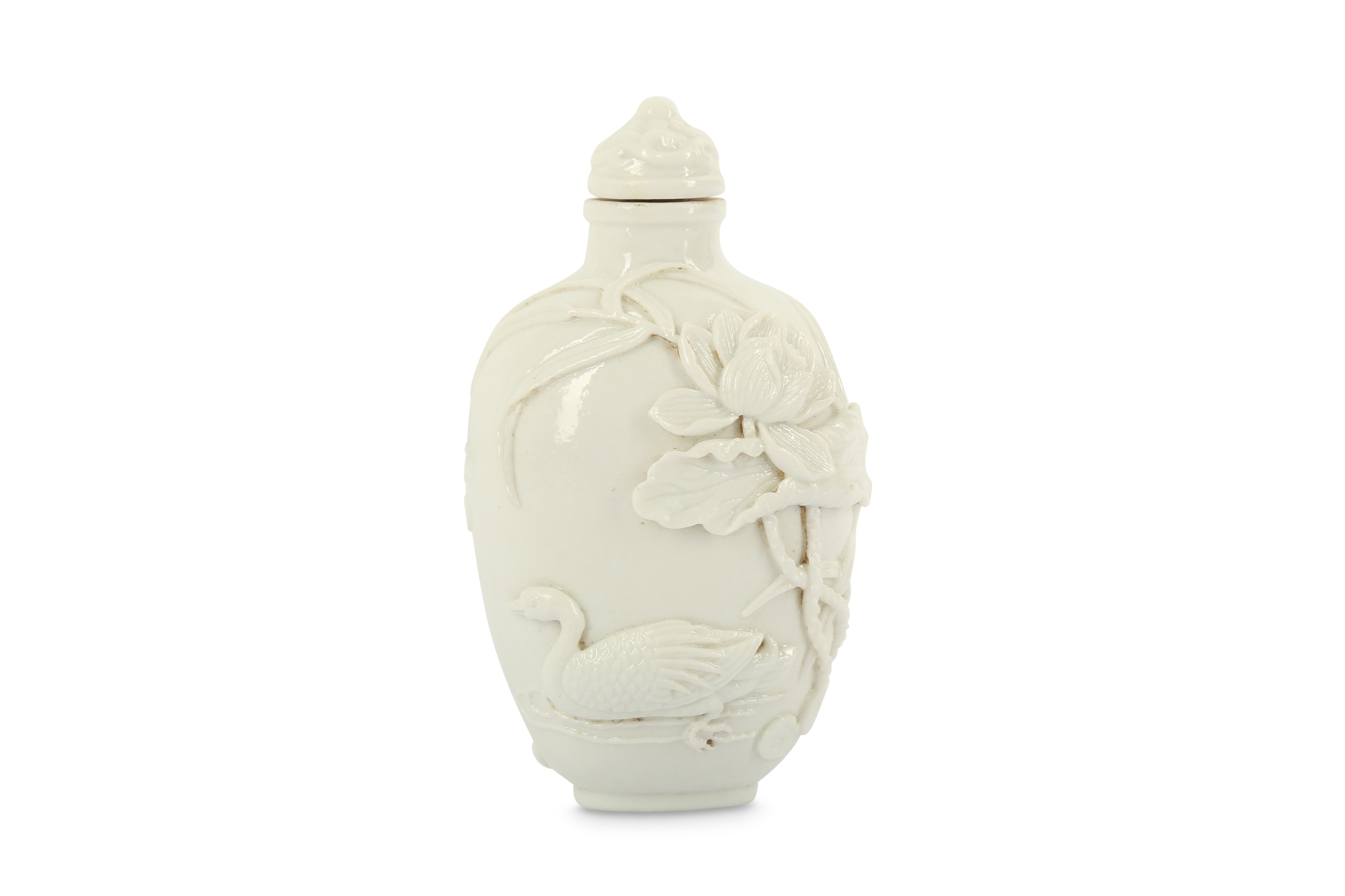 A CHINESE WHITE-GLAZED BISCUIT SNUFF BOTTLE AND STOPPER.