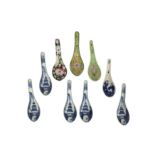 EIGHT CHINESE PORCELAIN SPOONS AND AN ENAMELLED SPOON.