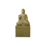 A MASSIVE CHINESE STONE FIGURE OF A MEDITATING BUDDHA.