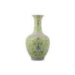 A CHINESE FAMILLE ROSE LIME GREEN-GROUND 'LOTUS' VASE.