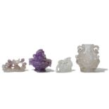 A COLLECTION OF AMETHYST AND ROCK CRYSTAL CARVINGS.