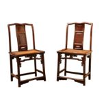 A PAIR OF CHINESE WOOD CHAIRS.