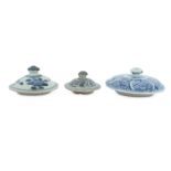 THREE CHINESE BLUE AND WHITE PORCELAIN COVERS.