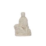 † A CHIENSE BLANC-DE-CHINE FIGURE OF GUANYIN.