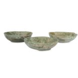 THREE CHINESE GREEN-GLAZED POTTERY 'EAR' CUPS.