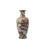 A CHINESE FAMILLE ROSE BLACK-GROUND 'MILLEFLEUR' VASE.