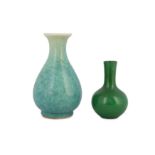 TWO CHINESE GREEN-GLAZED VASES.