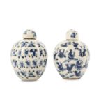 A PAIR OF CHINESE BLUE AND WHITE 'BOYS' JARS AND COVERS.