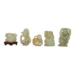 FIVE CHINESE JADE FIGURATIVE CARVINGS.