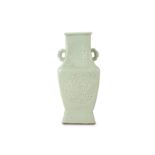 A CHINESE CELADON-GLAZED MOULDED VASE.