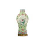 A CHINESE FAMILLE ROSE BALUSTER VASE.