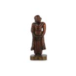 A BURMESE BAMBOO CARVING OF AN ACOLYTE.