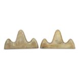 A PAIR OF CHINESE PALE CELADON JADE 'MOUNTAIN' BRUSH RESTS. Each carved as a three-peak mountain,