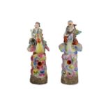 A PAIR OF CHINESE FAMILLE ROSE 'IMMORTALS' FIGURES.