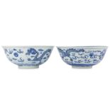 A PAIR OF CHINESE BLUE AND WHITE 'DRAGON' BOWLS.