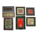 TWENTY-ONE CHINESE EMBROIDERED PANELS.