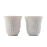 A PAIR OF CHINESE BLANC-DE-CHINE 'PRUNUS' CUPS.