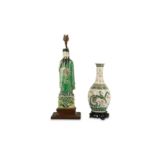 A CHINESE FAMILLE VERTE BISCUIT FIGURE AND A 'DRAGON' VASE.