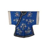 A CHINESE BLUE-GROUND LADY'S SILK JACKET.