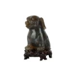 A CHINESE AGATE CARVING OF A LION DOG.