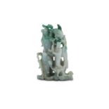 A CHINESE JADEITE CARVING OF THREE IMMORTALS.