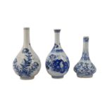 THREE CHINESE BLUE AND WHITE MINIATURE VASES.