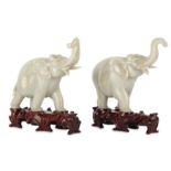 A PAIR OF CHINESE WHITE HARDSTONE ELEPHANTS.