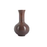 A CHINESE REALGAR GLASS BROWN BOTTLE VASE.