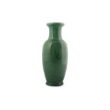 A CHINESE APPLE-GREEN GLAZED VASE.