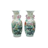 A PAIR OF LARGE CHINESE FAMILLE ROSE 'PHOENIX' VASES.