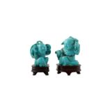 A PAIR OF CHINESE TURQUOISE 'BOYS' CARVINGS.