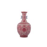 A CHINESE FAMILLE ROSE 'DRAGONS AND FLOWERS' VASE.
