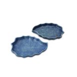 A PAIR OF CHINESE BLUE-GLAZED 'LEAF' TRAYS.