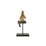 A CHINESE GILT-BRONZE FIGURE OF GREEN TARA.