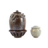TWO CHINESE GLAZED POTTERY JARS, COVERS AND STAND.