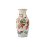 A CHINESE FAMILLE ROSE 'LION DOGS' VASE.