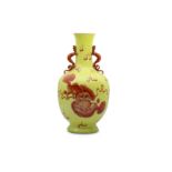 A CHINESE YELLOW-GROUND 'LION DOG' VASE.