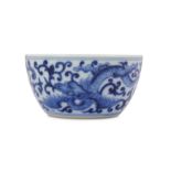 A CHINESE BLUE AND WHITE 'DRAGON' CUP.